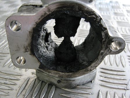 Yuck this is an emission control valve from a van .To keep the vehicle running correctly these need periodic maintenance